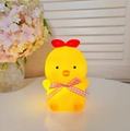 Cute yellow chick night light made of soft vinyl with warm glow and pink ribbon - Big Meow Chick - Yellow - Pink
