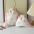 Set di sacchetti organizer bianco crema con fiocco rosa e chiusura a cordoncino - Grande / Rosa