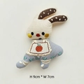Detailed embroidery on white fabric rabbit doll with carrot bib measuring 9cm by 7cm - Apple Apron Rabbit (Blue)