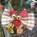 Christmas bow decoration with brown houndstooth fabric, red sequins, and gold bells - Style 26-Houndstooth with Red Glitter Leaf Bell Bow