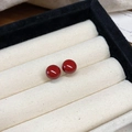 Glossy red spherical stud earrings with silver needles in a jewelry display box - 10mm Flat Round Stud / Red