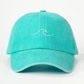 Close-up of mint green cotton baseball cap featuring high-quality white wave embroidery - Lake Blue