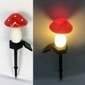Solar powered garden lamp featuring red and white mushroom design with warm LED glow - Single Mushroom Red