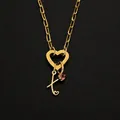 Elegant gold heart clasp necklace with letter K charm and pink gem, stainless steel. - Letter X