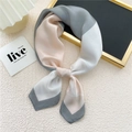 Elegant silk scarf with grey and pink geometric color block design in a stylish knot - 9 Heart Lines Patchwork Grey