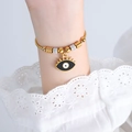 Gold-plated Evil Eye bracelet with black enamel pendant and white zircon accents on wrist - E457-Black Enamel Gold Color Bracelet