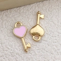 Pink enamel heart-shaped charms in gold-finished alloy for DIY jewelry and keychain - Pink Heart Key Pendant (10989)
