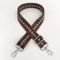Close-up of adjustable brown nylon bag strap with white arrow pattern and silver hardware - Coffee Silver Thread + Silver Buckle