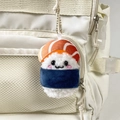 Close-up of cute salmon sushi plush keychain with metal chain on a white canvas bag - Blue / 9cm