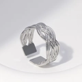 Close-up of adjustable silver woven mesh metal ring on a white display stand - US 7 / Braided Texture (JR008) / Steel