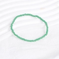 Close-up of mint green seed bead bracelet showing uniform round beads and smooth texture - Mint Green