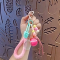 Portachiavi da tennis rosa con cordino blu intrecciato e chiusura a forma di cuore - Rosa