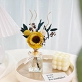 Reed diffuser set with yellow sunflower and black sticks in textured glass bottle - Teardrop Bottle Dried Flower Reed Diffuser - Spring Tea