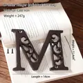 Vintage cast iron letter M wall decor sign with screws for DIY house numbering - Letter M