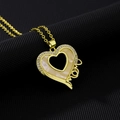Close-up of gold heart pendant necklace with MOM lettering and zircon stones - Style E (Hollow Heart MOM/With Diamonds)