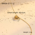 Macro shot of gold heart pendant with zircon inlay and detailed product dimensions - Double Layer Gold Rhinestone Heart (NMSN-E717-3)