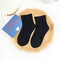 Calzini da donna con bordo a volant in nero profondo, stile casual in cotone a maglia - Nero Polsino Largo