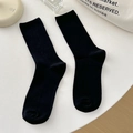 Chaussettes mi-hautes noires classiques avec texture côtelée pour un style minimaliste - Taille unique / Noir
