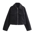 Detail view of the black woolen jacket featuring a lapel collar and large cargo pockets - Black