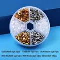 Macro shot of assorted metal butterfly and silicone earring backs in a circular storage box - 6-Grid Mixed Set Approx. 350pcs + Box