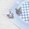 Macro shot of 15mm silver star charms with purple enamel and sparkling zircon inlay - 13# Full Diamond Five-Pointed Star