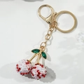 Squisito portachiavi a ciliegia con strass rossi e bianchi su catena dorata - Stile con Strass Completo Rosso e Bianco (KC2017)