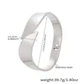Polished silver stainless steel open bangle bracelet with geometric twist design - Intertwined Geometric Open Bracelet (Z531) / Silver