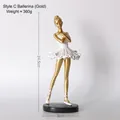 Elegante scultura di ballerina di danza classica in resina oro e bianco con base nera - Statua di Ballerina di Balletto - Oro Stile C
