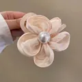 Elegant champagne satin flower hair tie featuring a large pearl center detail - Beige Flower Claw Clip