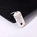 Detailed view of engraved stainless steel dog tag keychain with friendship quote - Style 4 (Sisters Love)