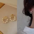 Elegant gold rose stud earrings with circular pearl trim in a vintage French style - 30# Retro French Hollow Rose Pearl Surround (Silver Needle)