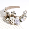 Detail of baroque headband with pearls, rhinestones and fabric flowers on a wide band - White