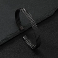 Minimalistisches schwarzes Edelstahl-Armband in C-Form mit geflochtener Struktur - Schwarz