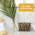 Leopard print EVA makeup bag on a bathroom counter with tropical leaves and a towel - Single Piece