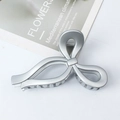 Matte silver alloy bow hair claw clip for thick hair in minimalist Audrey Hepburn style - Silver