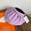 Macro detail of purple sun hat fabric with unique pleats and wave-shaped wide brim - One Size / Purple