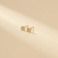 Elegant gold cherry stud earrings with bow design and sparkling white cubic zirconia - Gold Bow Pendant Style