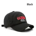 Black washed cotton baseball cap with red Canada embroidery and curved brim - Black