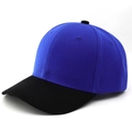 Detail of a blue and black baseball cap featuring a six-panel design and stitched eyelets - Black Brim Royal Blue