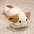 Plush cat doll in beige and brown, cute soft stuffed animal toy in lying position - Cat