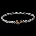 Detailed close-up of woven white pearl belt with rose gold hollow butterfly buckle - Rose Gold Hollow Butterfly Clasp (Style 17)