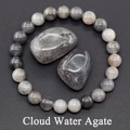 Macro detail of cloud water agate bracelet and natural stones with marble texture - Cloud Water Agate
