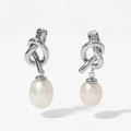 Elegant knot design stainless steel earrings featuring natural white pearl pendants - Silver (PDE2651)