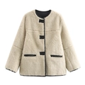 Detail of cream sherpa fleece jacket featuring contrast black leather piping and button fasteners - S / Tops / Beige