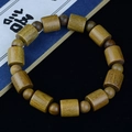 Polished brown wood bead bracelet with cylindrical beads and natural grain texture - Green Sandalwood Barrel 12mm*11 Beads (with Spacers)