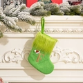 Green knitted Christmas stocking with letter F embroidery and plush lime green trim - Letter F