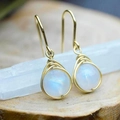Handmade gold wire-wrapped earrings featuring natural moonstone gems in a boho style - Gold Wire Wrapped Moonstone / Gold