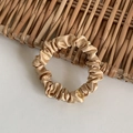 Elegant champagne gold satin silk scrunchie with a soft glossy texture for hair - Khaki