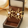 18K gold plated cutout flower earrings with central pearl in a brown jewelry box - Gold Snowflake Coral Style (KE119646-SP)