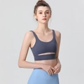 High-impact deep blue-grey sports bra with hollow cutout detail and elastic support - S / Code Blue